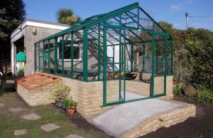 10 x 14 Robinson Dwarf wall greenhouse with brick cold frame