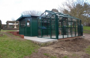 8 x 12 Robinson greenhouse with 10 x 10 Lushington buildings, Workshop.