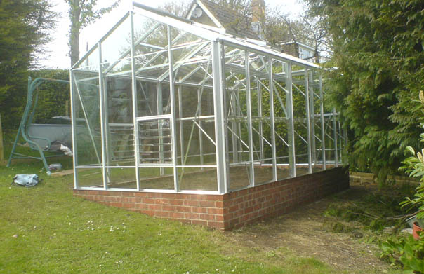 8 x 14 Robinson greenhouse with brick base.